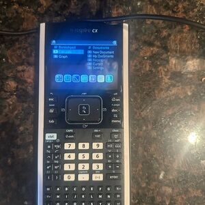 Texas Instruments TI-Nspire CX with Blue and Black Interface